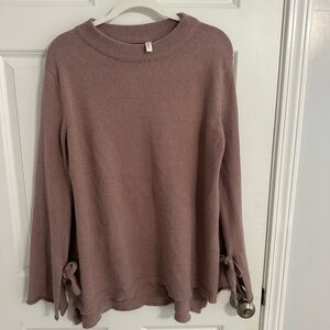 Oversized knit sweater with bows